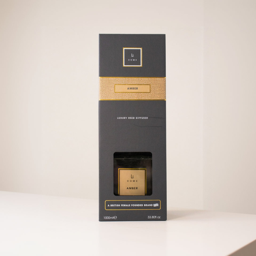 Black and gold box with a brand logo on a white background