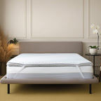 Mattress on a bed in a bedroom setting with neutral decor