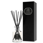 Parks diffuser with black reeds and black box on a white background