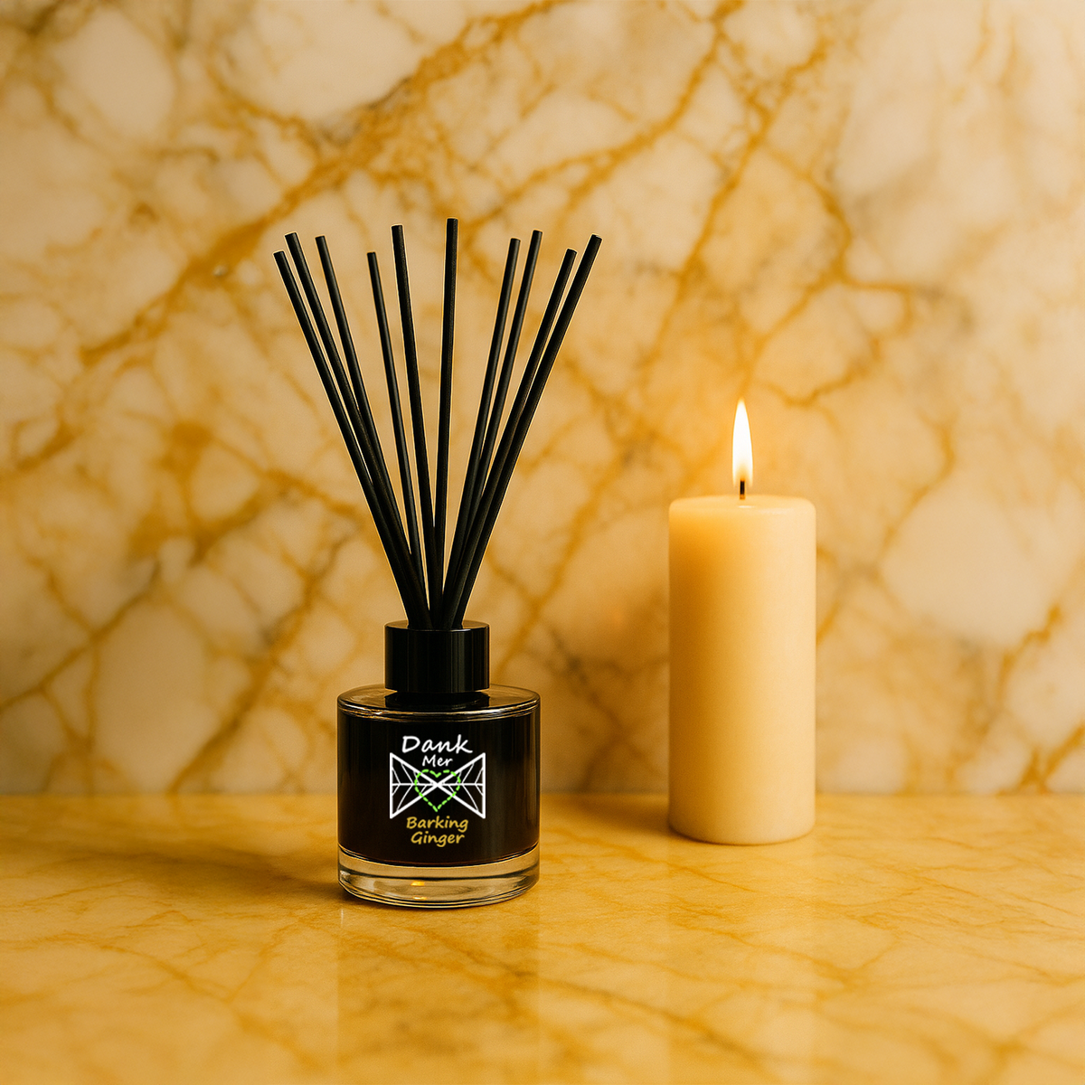 Diffuser with black reeds and a lit candle on a marble surface