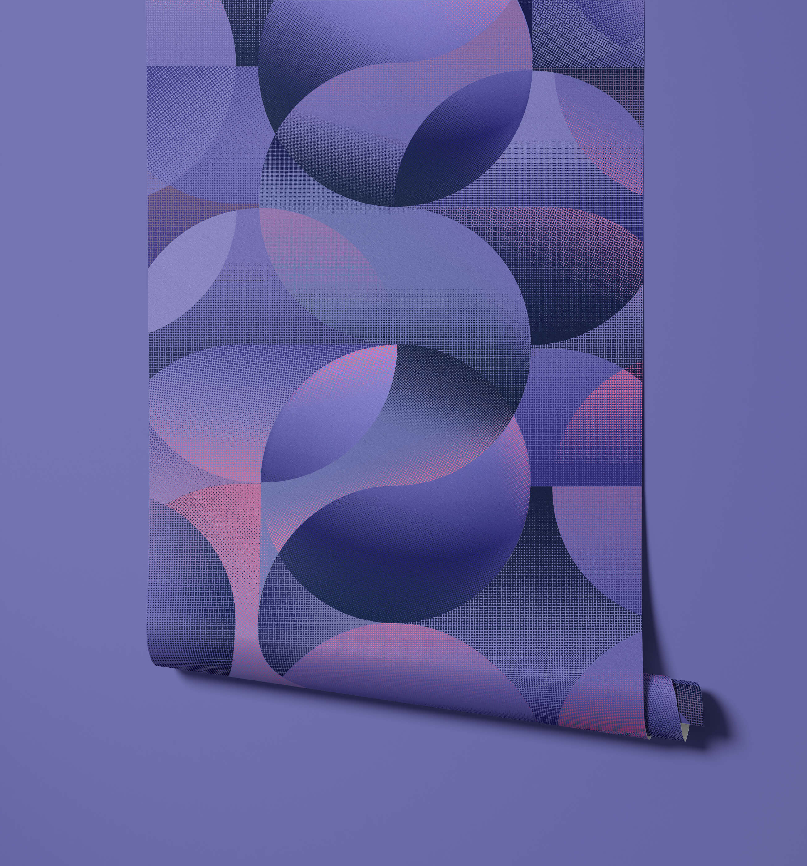 Roll of purple wallpaper with abstract circular design on a matching purple background