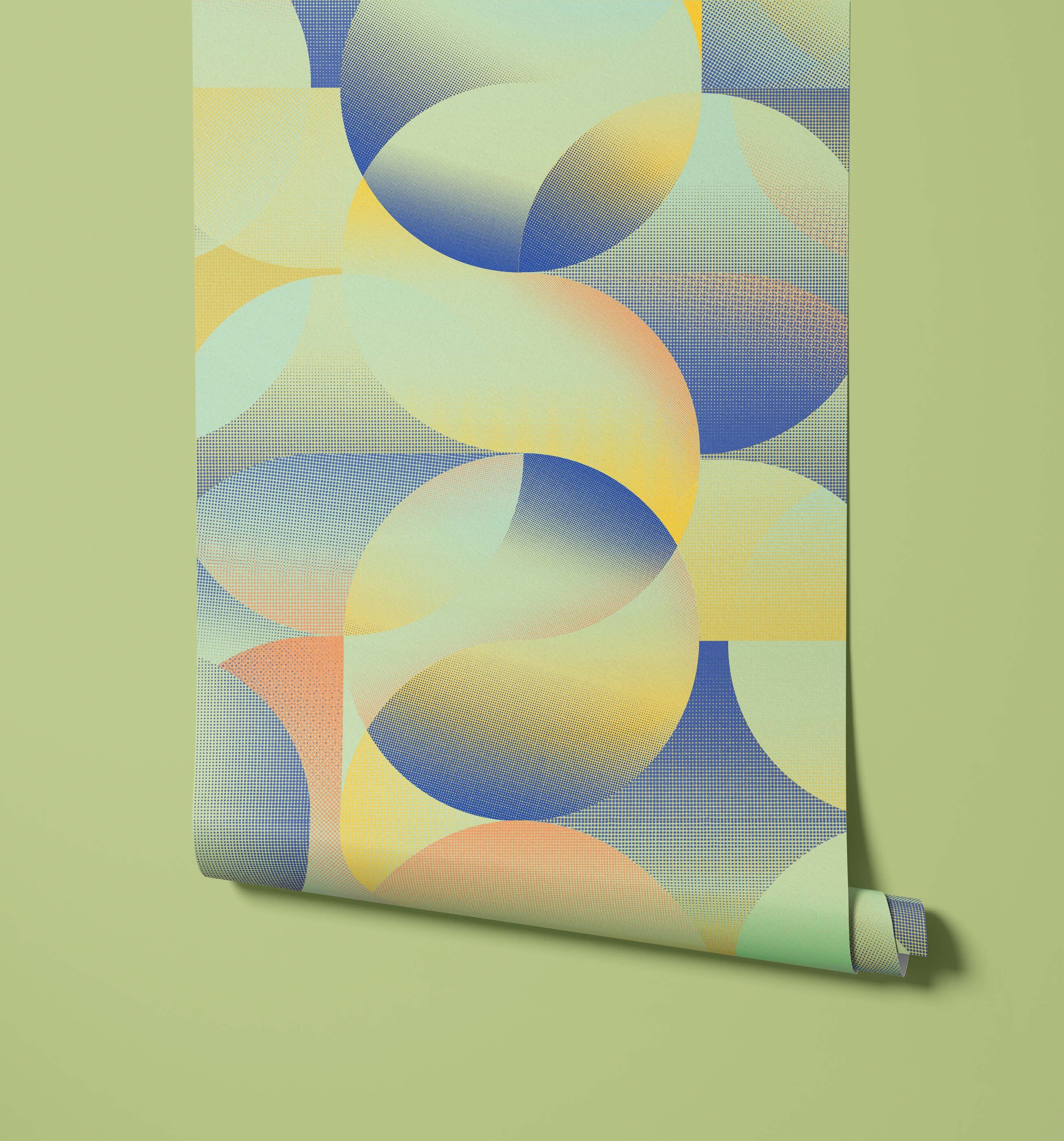 Roll of wallpaper with abstract circular design on a green background