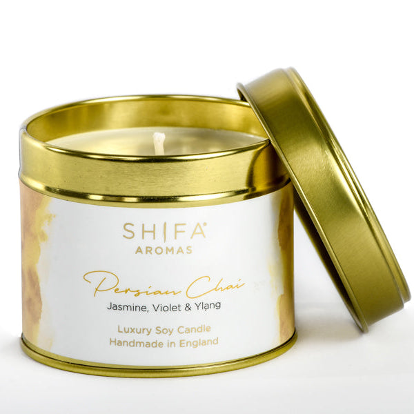 Shifa Aromas candle in a gold tin with a white label on a white background