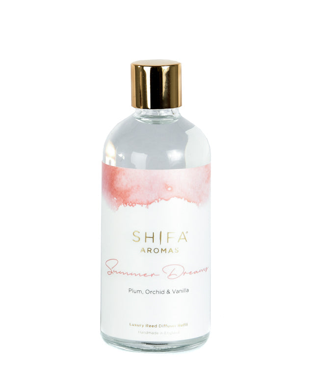 Shifa Aromas shower dream bottle with gold cap on a white background