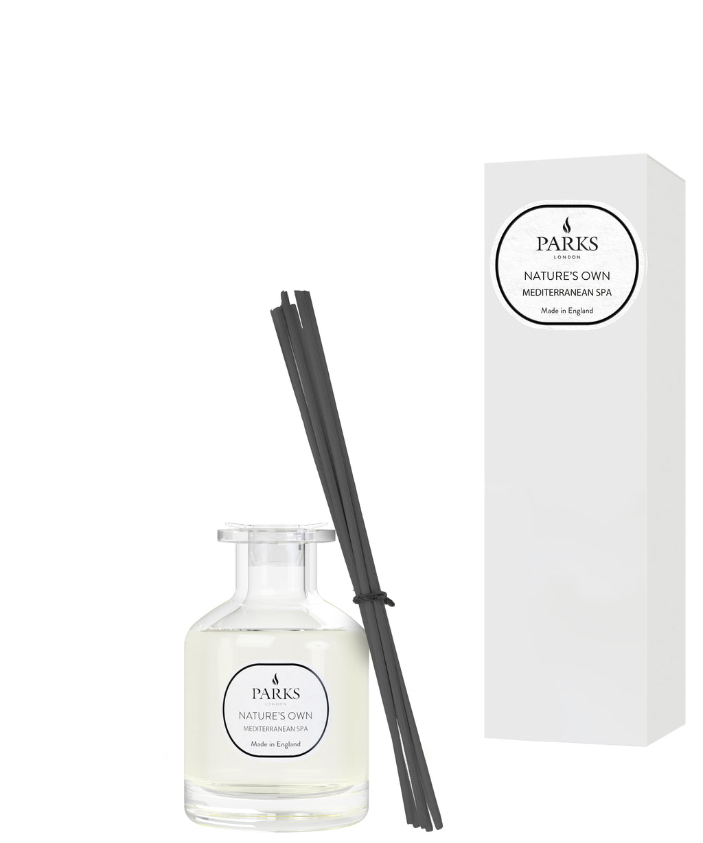Parks diffuser set with bottle, sticks, and packaging on a white background