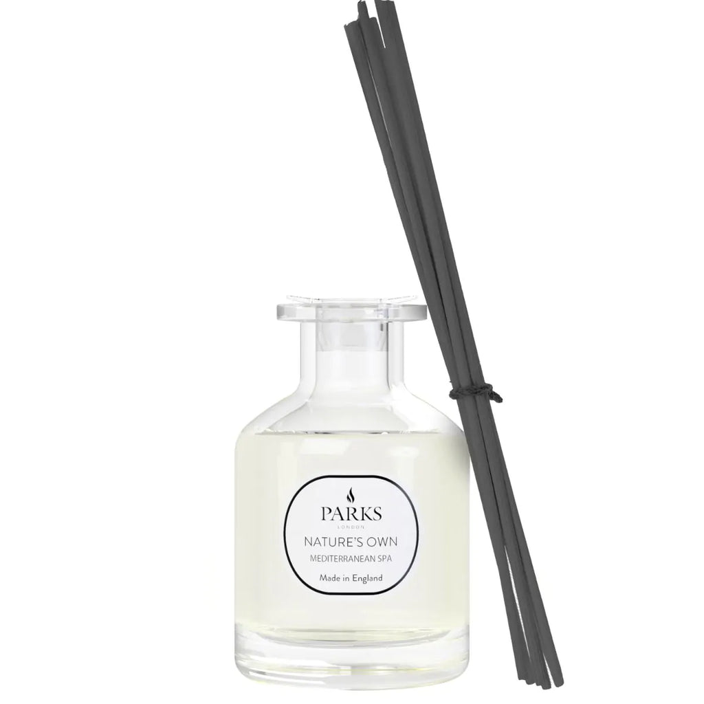 Parks diffuser bottle with black reeds on a white background