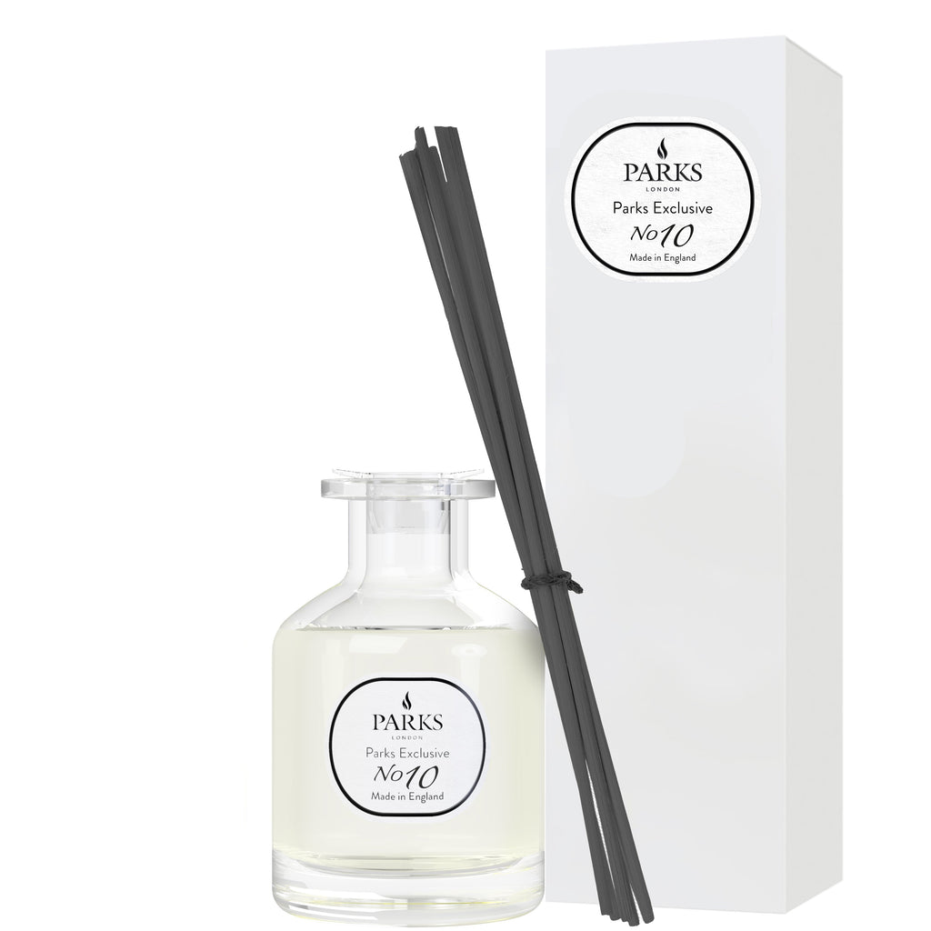 Parks diffuser set with bottle, sticks, and packaging on a white background