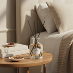 PARKS diffuser on a wooden table with books and snacks in a cozy living room setting