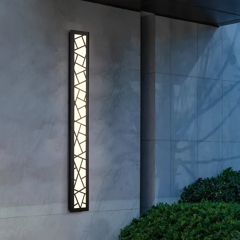 Vertical wall light fixture on a building exterior