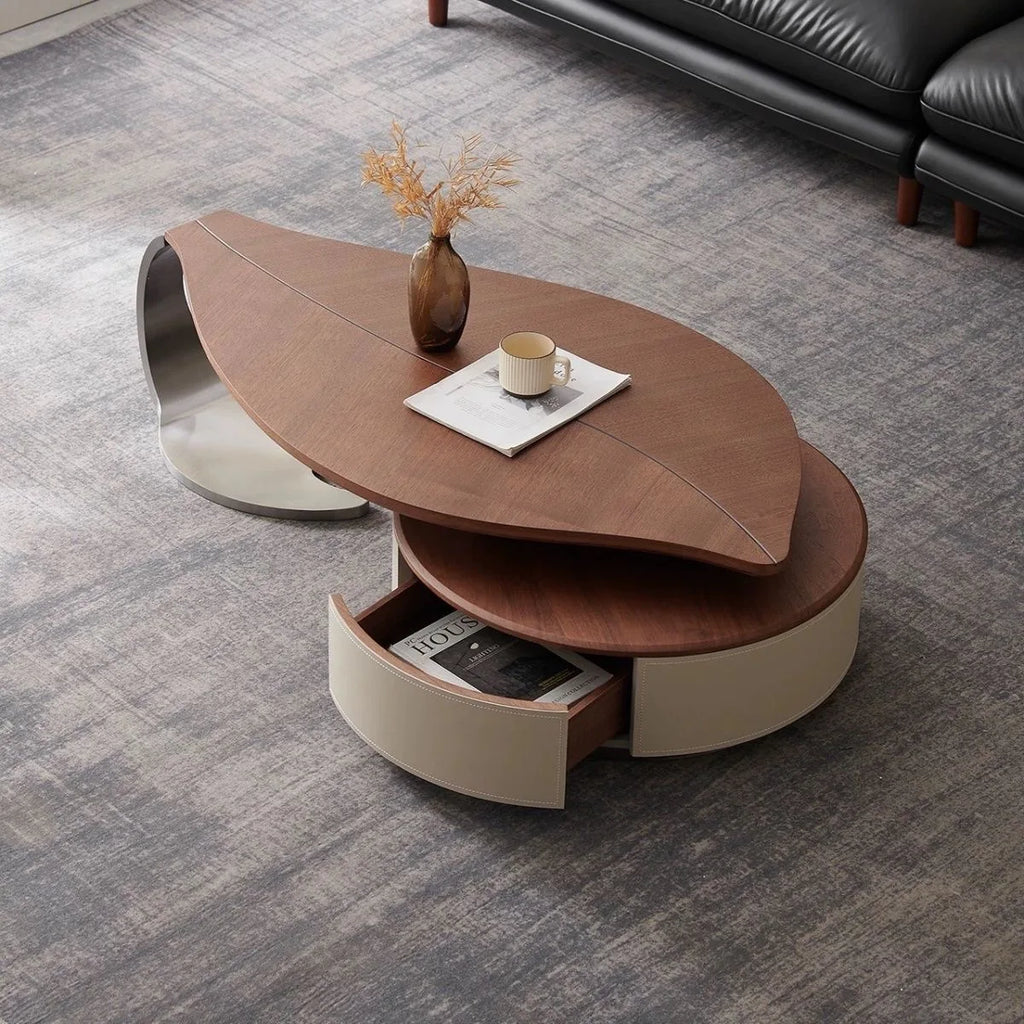 Modern coffee table with a wooden top and beige base in a living room setting.
