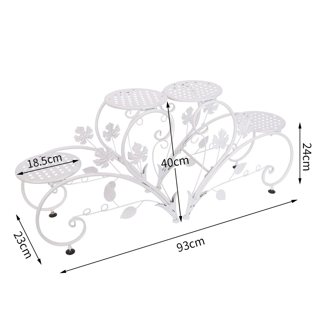 White metal plant stand with floral design and dimensions labeled on a white background
