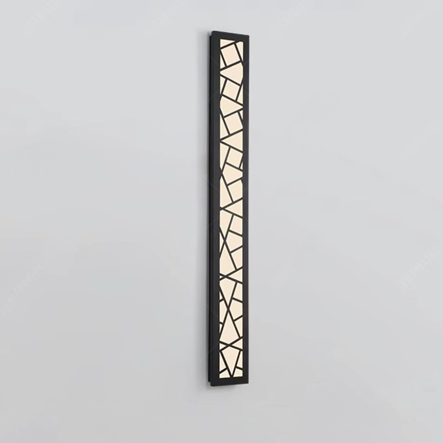 Vertical wall light fixture with geometric design on a gray background