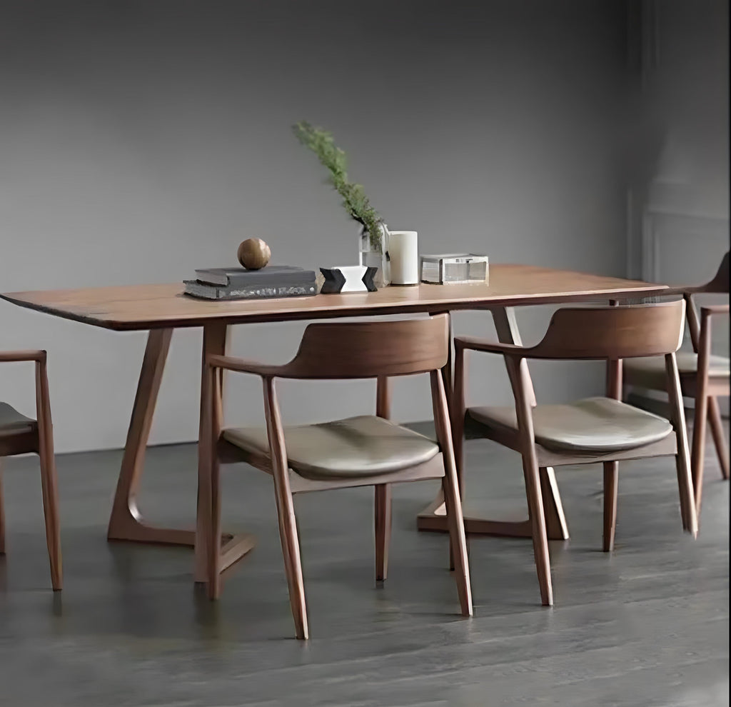 Dining table with chairs in a modern room setting