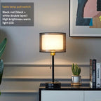 Table lamp with pull switch on a side table in a room setting