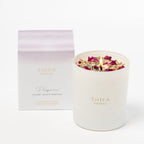 Shifa Aromas candle with floral elements and packaging on a white background