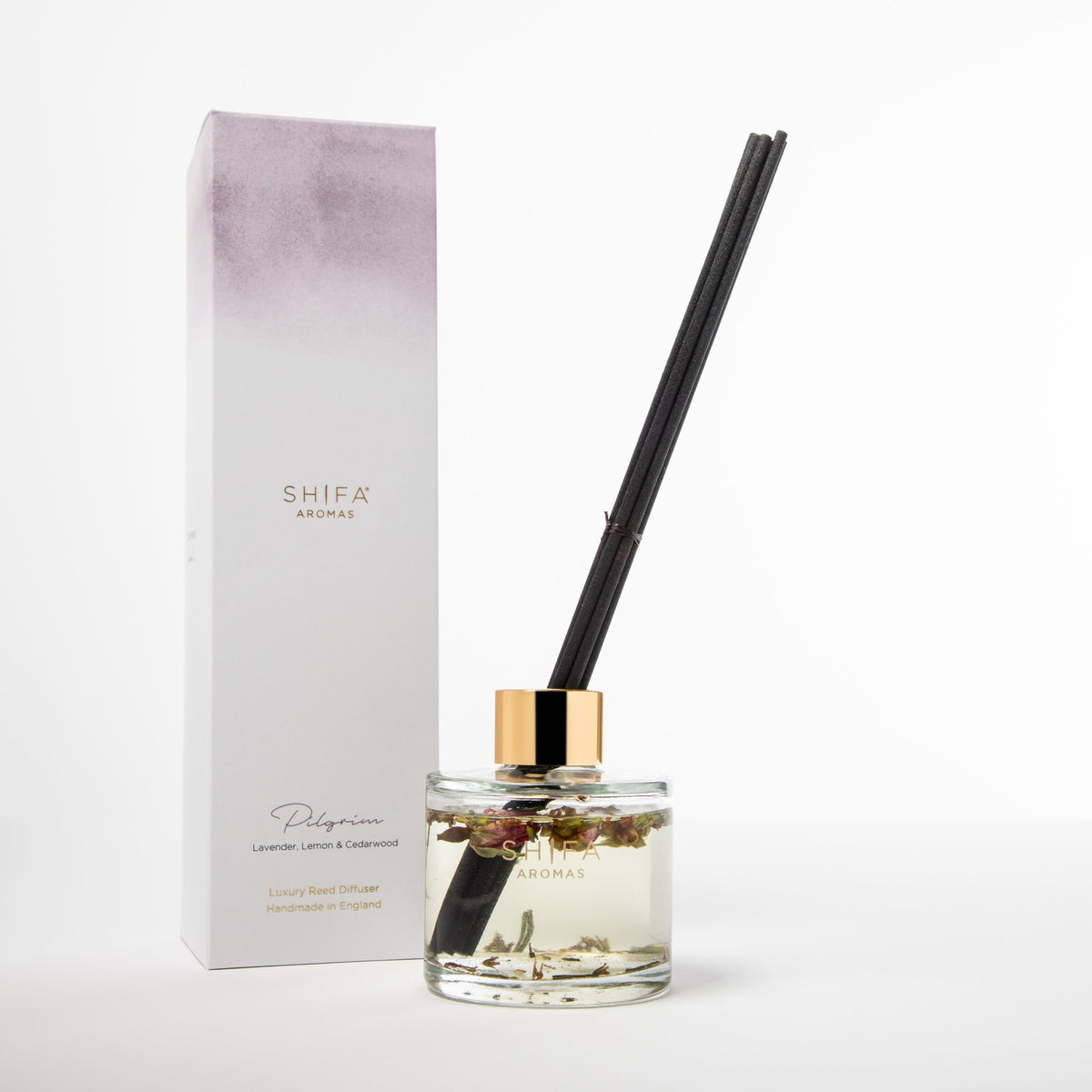 Shifa Aromas diffuser with black reeds and packaging on a white background