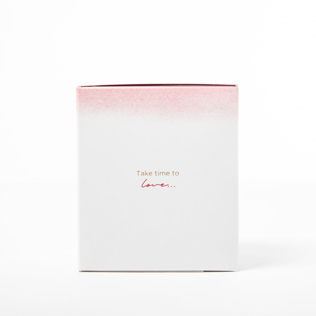 White box with pink top and text 'Take time to love' on a white background