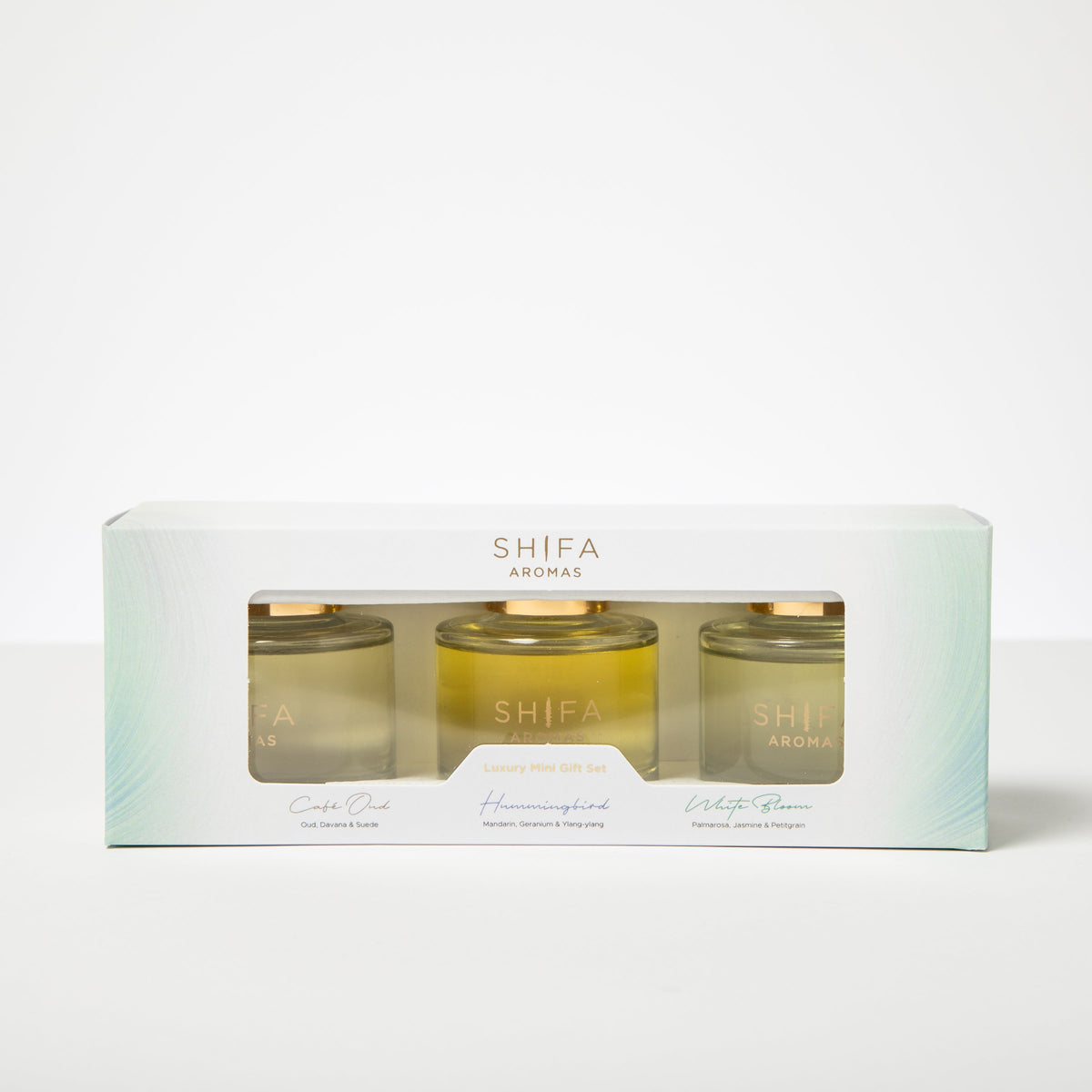 Set of three candles in a Shifa Aromas packaging on a white background