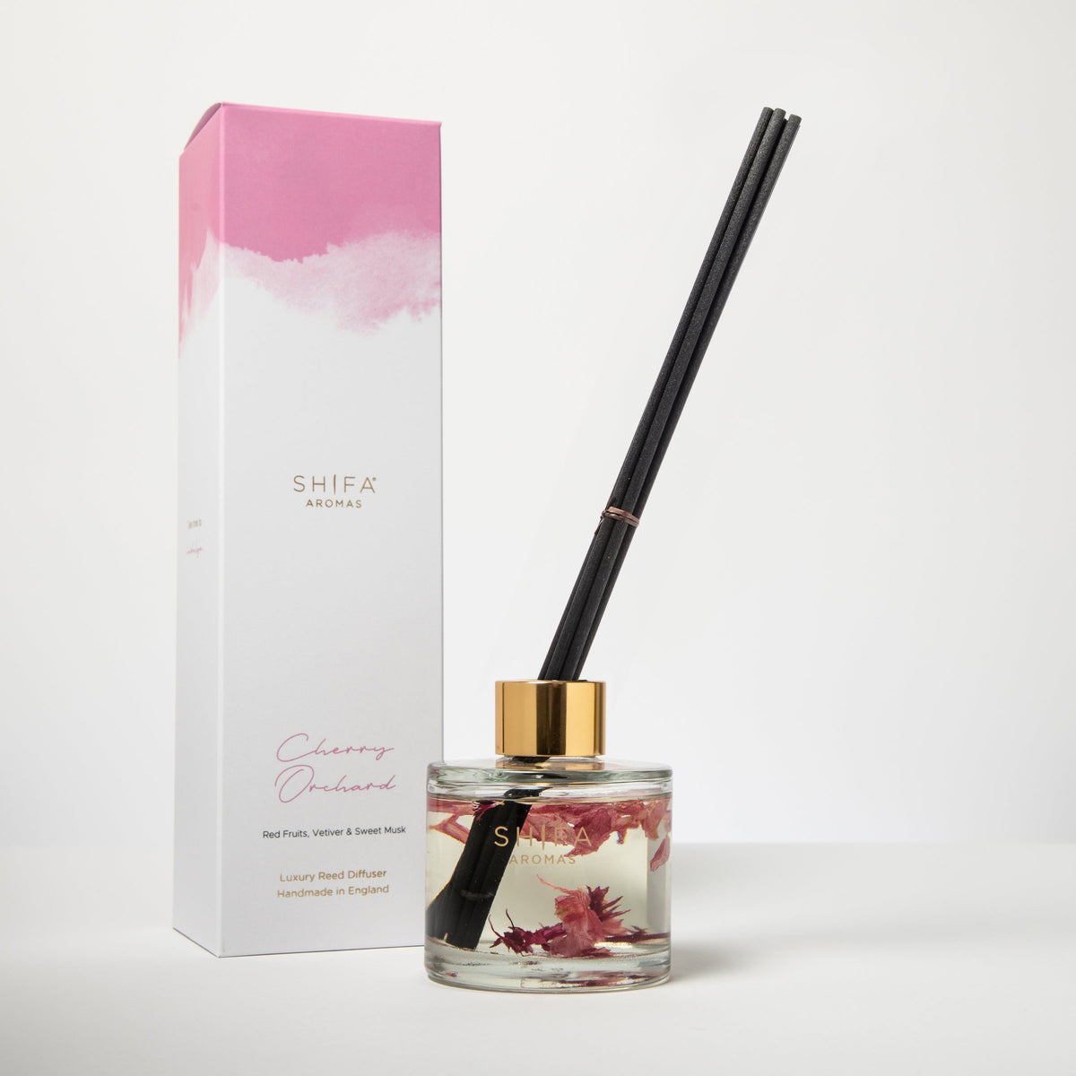 Shifa Aromas Cherry Orchid diffuser with packaging on a white background