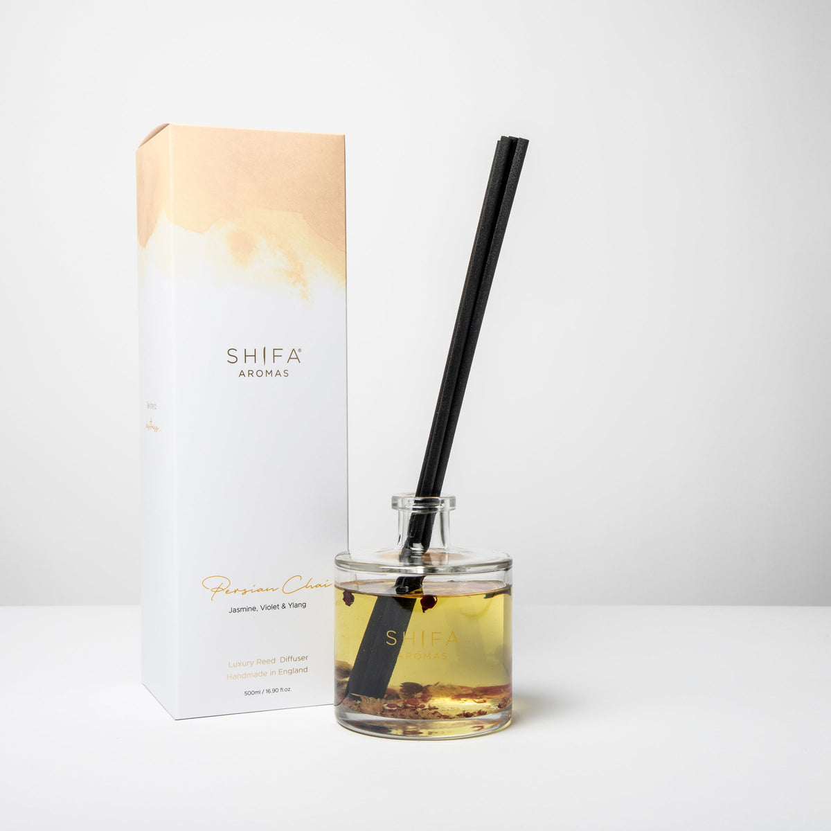 Shifa Aromas diffuser bottle with black straw and packaging on a white background