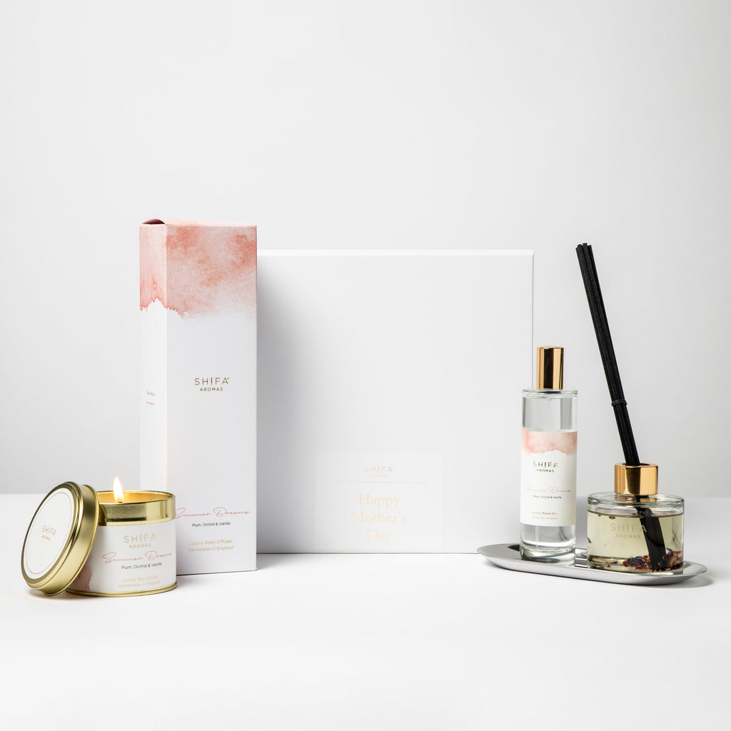 Set of Shifra candles and diffusers on a white background