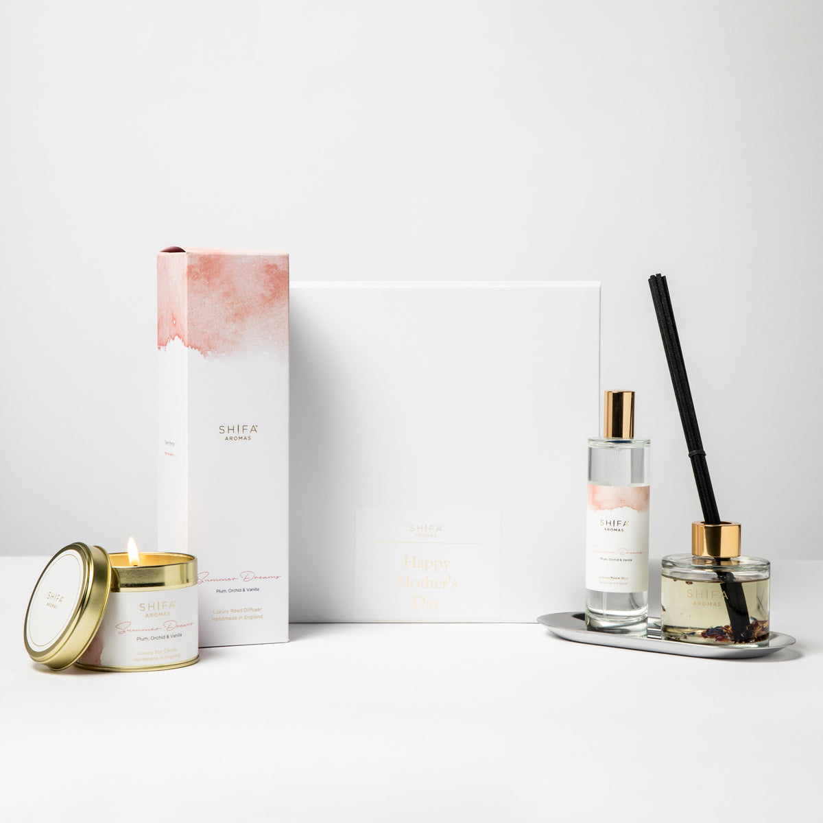 Set of Shifra candles and diffusers on a white background