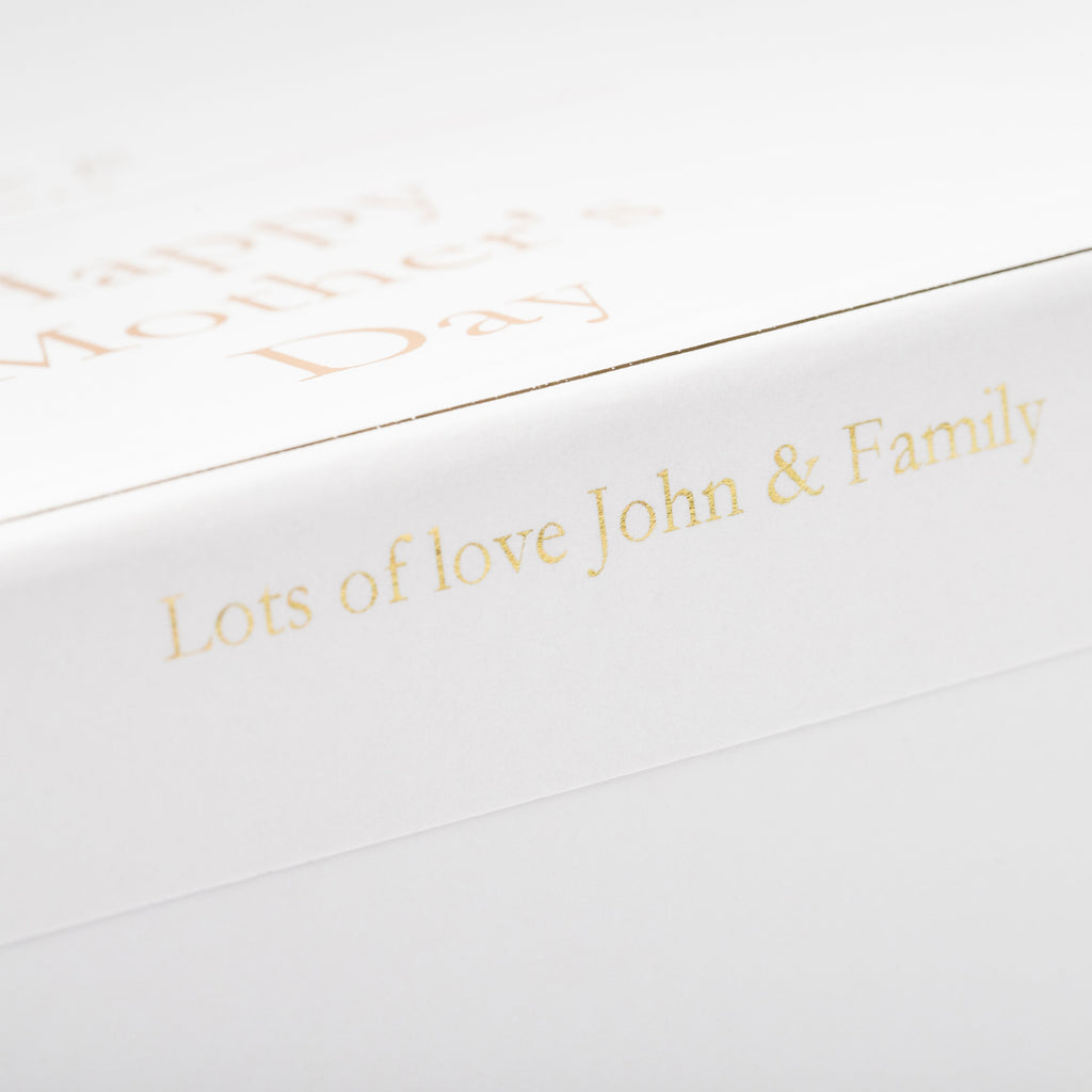 White card with gold text 'Lots of love John & Family' on a white background