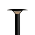 Black outdoor lamp post on a white background
