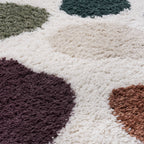 Close-up of a textured rug with geometric pattern
