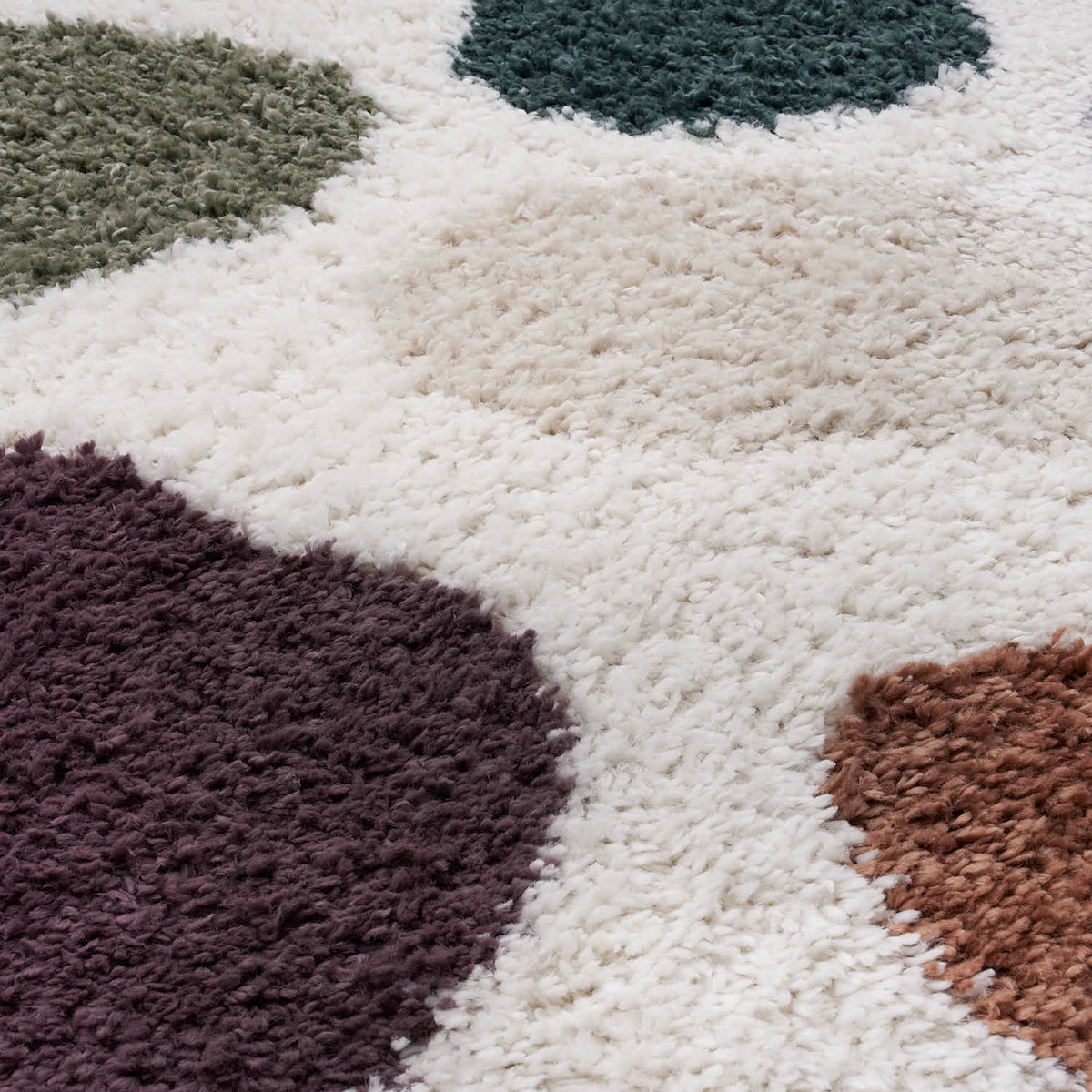 Close-up of a textured rug with geometric pattern