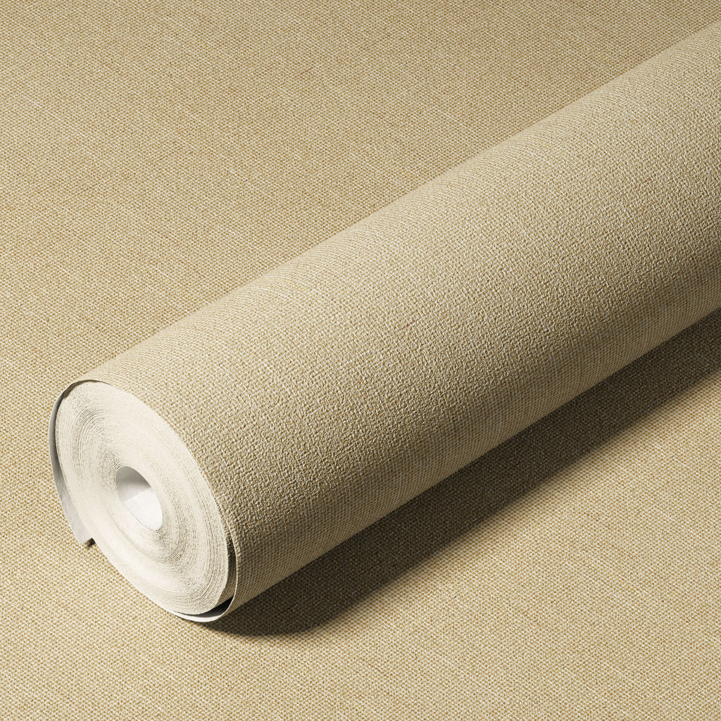 Roll of beige textured wallpaper on a matching background
