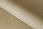 Close-up of beige fabric with a textured pattern