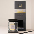 Aromatherapy diffuser with packaging on a neutral background