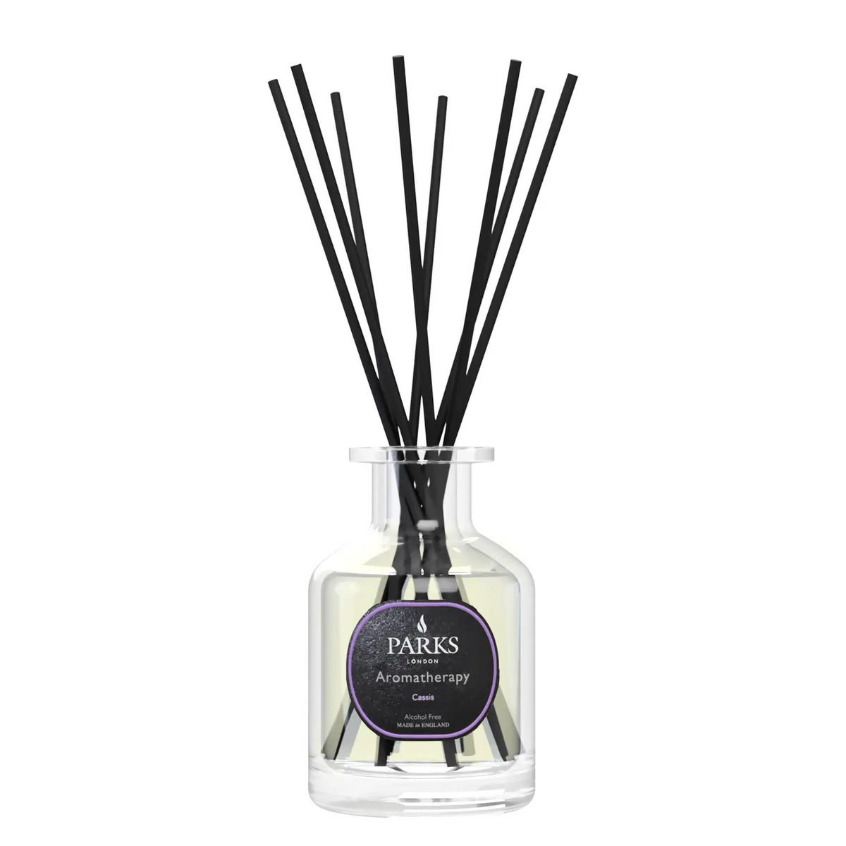Diffuser with black sticks in a glass bottle on a white background