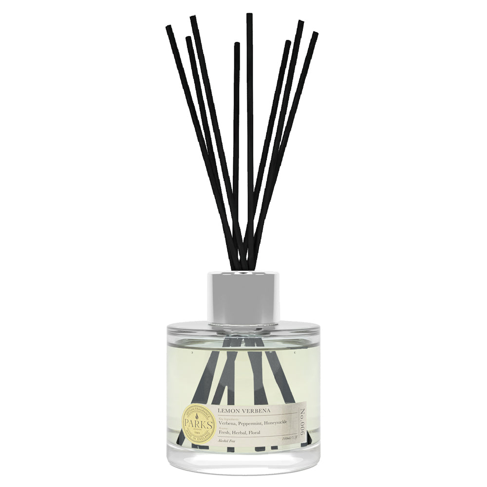 Diffuser bottle with black reeds on a white background