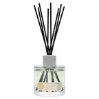 Diffuser bottle with black reeds on a white background