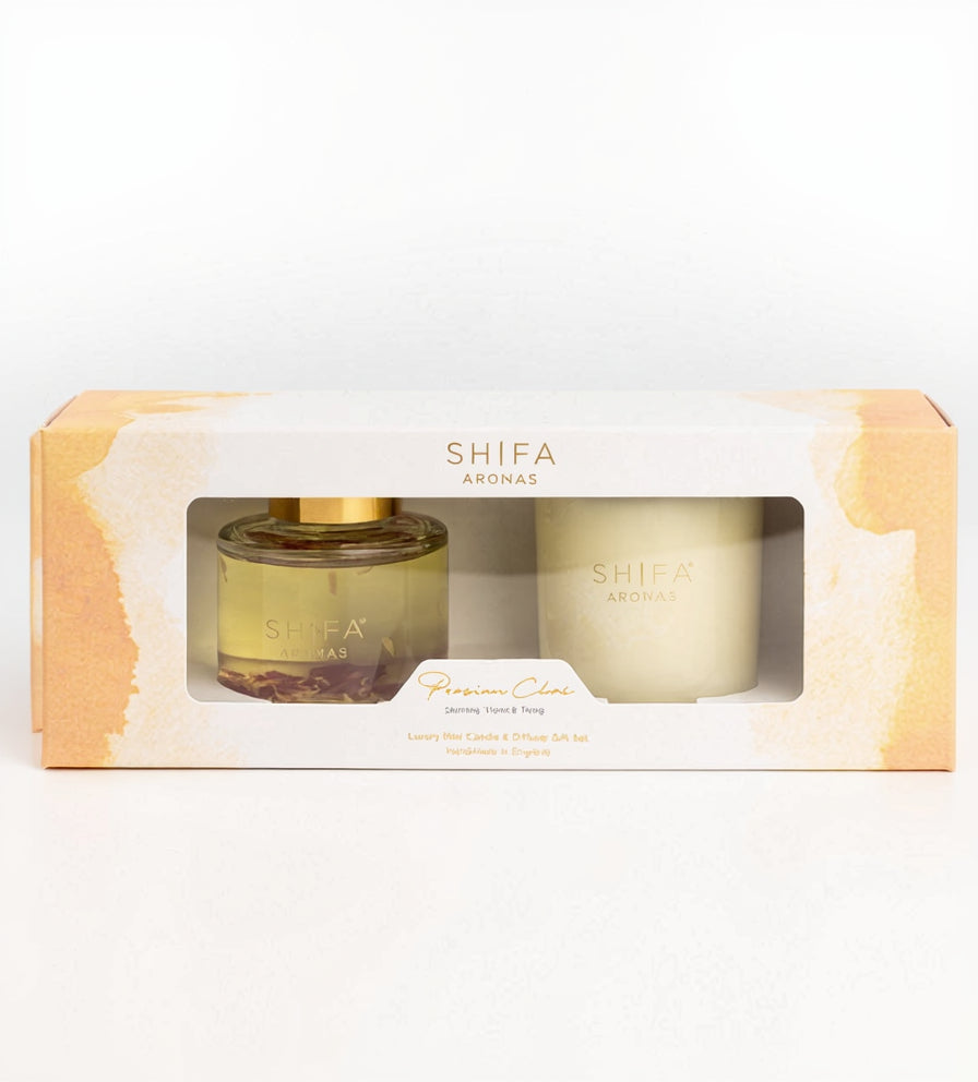 Shifa Aromas candle and diffuser set in a windowed box on a white background