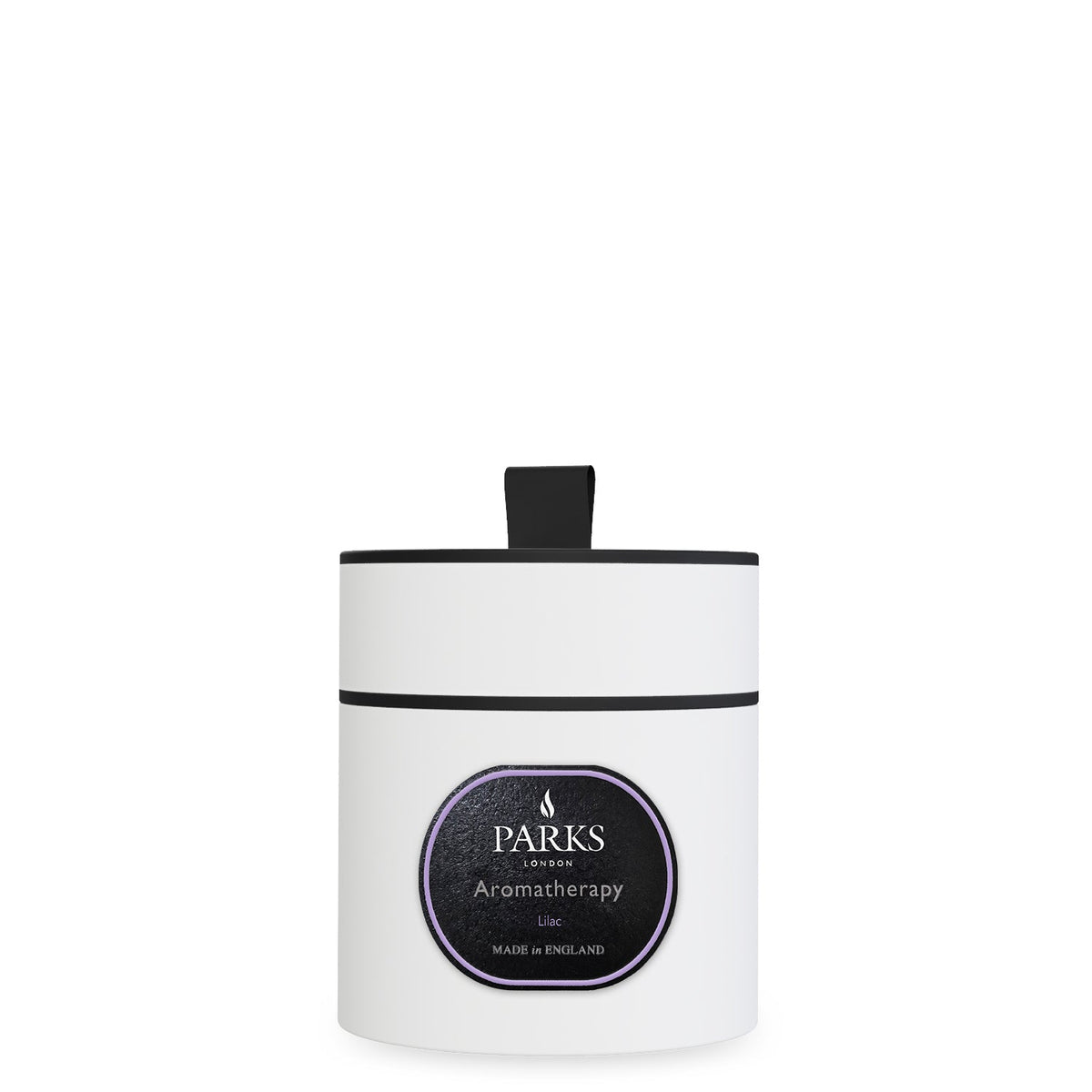 White candle with black lid and label on a white background
