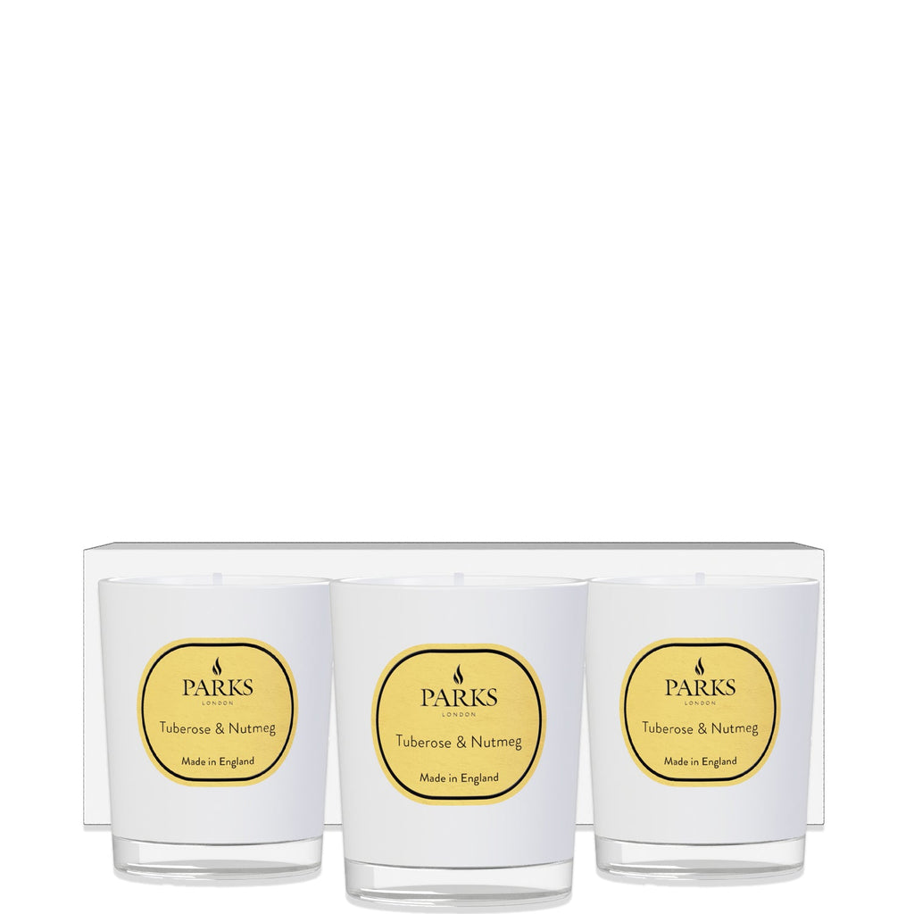 Three candles with 'Parks' labels on a white background