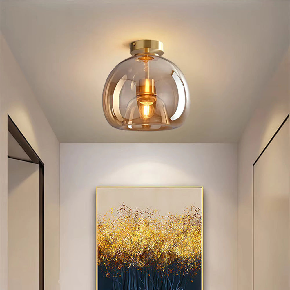 Modern dome semi-flush glass ceiling light with black or gold finish and E27 bulb fitting for stylish interior lighting.