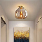 Modern dome semi-flush glass ceiling light with black or gold finish and E27 bulb fitting for stylish interior lighting.