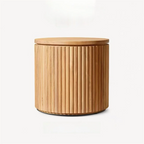 Wooden cylindrical container with a lid on a white background
