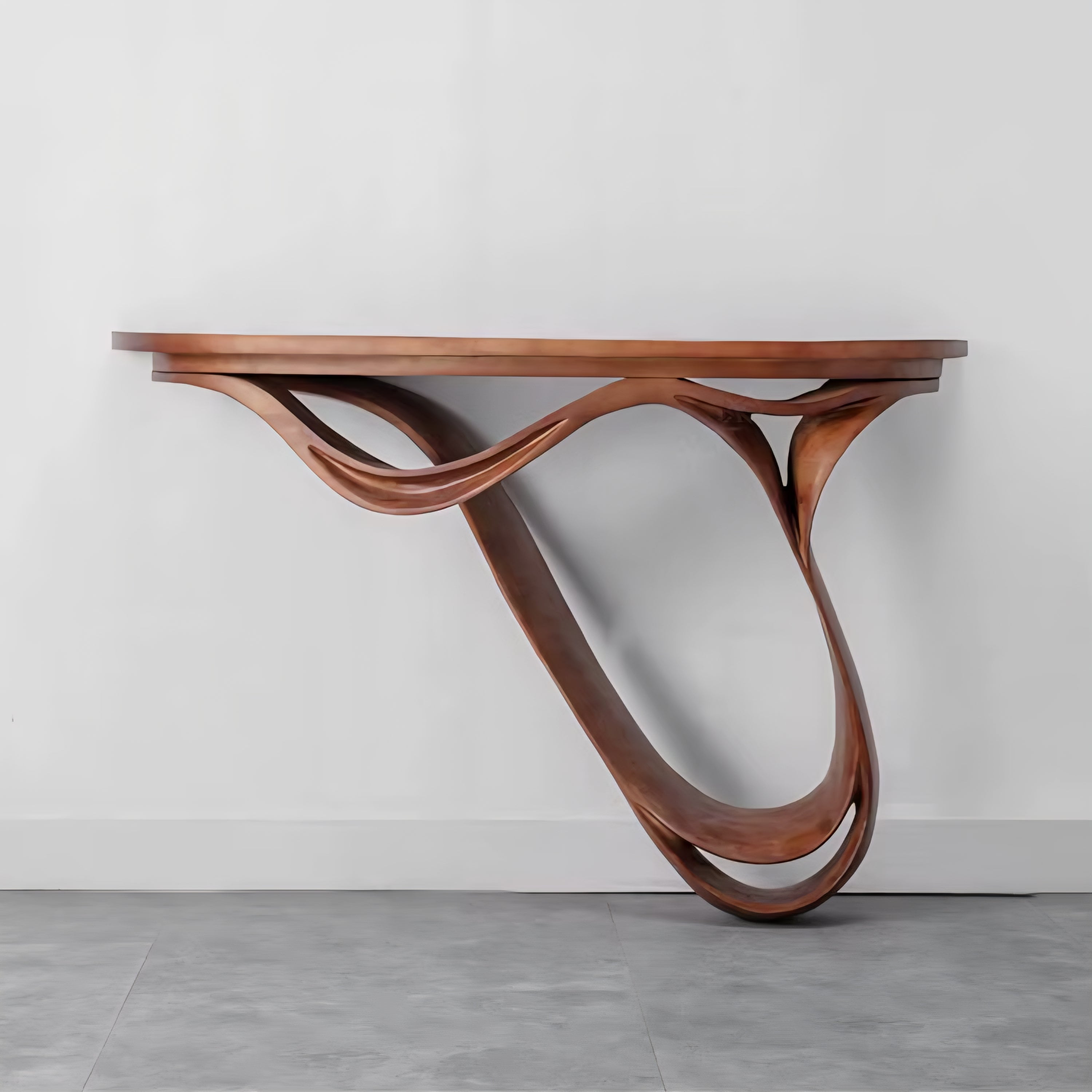 Wooden console table with wavy legs on a gray floor and white wall