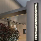 Wall-mounted light fixture with price list on a pink background, featuring the brand 'HISINUV'.