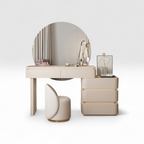 Beige vanity table with round mirror and chair on a white background