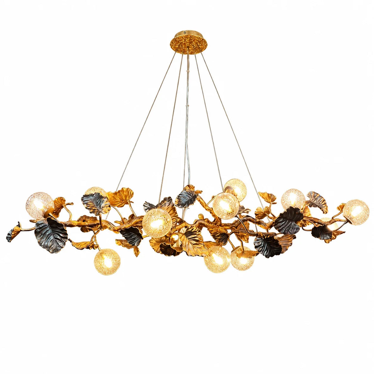 A modern multi-light chandelier with a gold-toned metal branch structure, dark textured leaf accents, and multiple clear glass globe bulbs, shown against a plain white background.