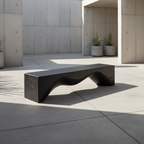Modern black bench in a concrete outdoor setting with potted plants.