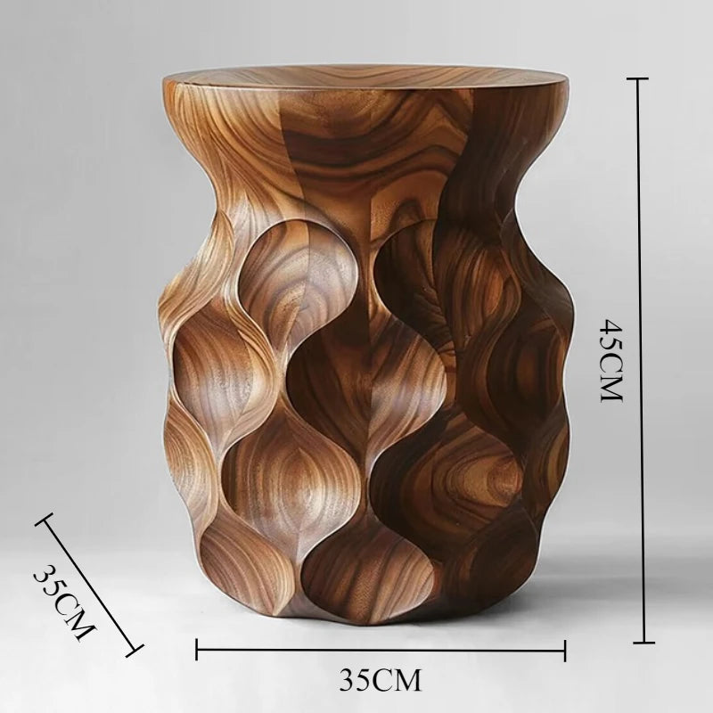 Wooden side table with wavy design and dimensions on a gray background