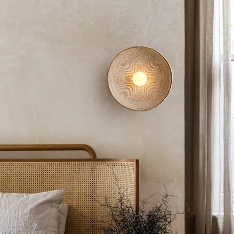 Desert Scandi wall lamp with a minimalist metal design and warm white LED lighting for modern bedrooms and living spaces.