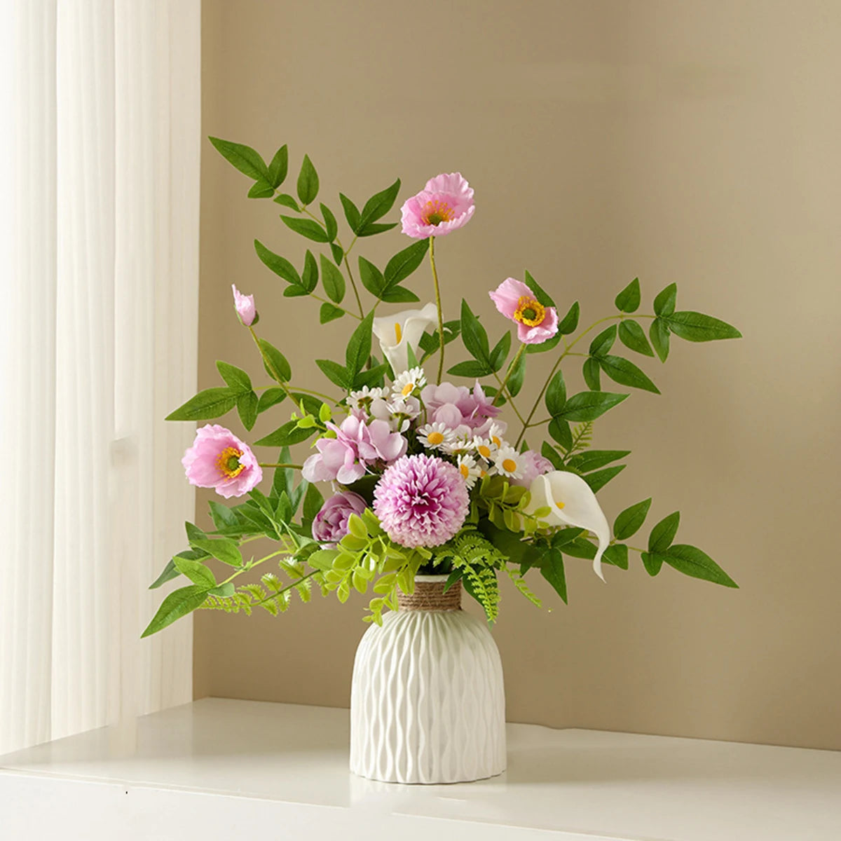 Bouquet of flowers in a white vase on a shelf with a beige wall background